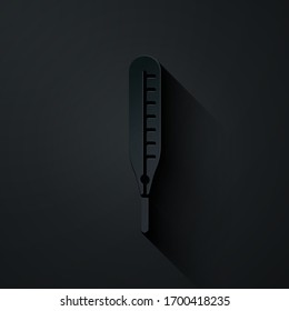 Paper cut Medical thermometer for medical examination icon isolated on black background. Paper art style. Vector Illustration