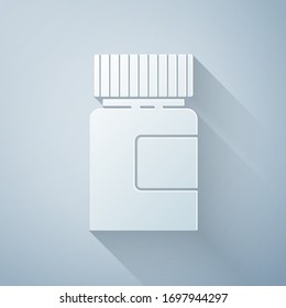 Paper cut Medicine bottle icon isolated on grey background. Bottle pill sign. Pharmacy design. Paper art style. Vector Illustration