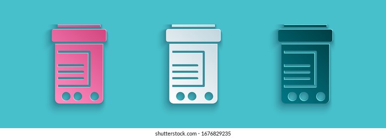 Paper cut Medicine bottle and pills icon isolated on blue background. Bottle pill sign. Pharmacy design. Paper art style. Vector Illustration