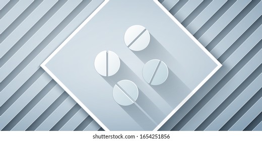 Paper cut Medicine pill or tablet icon isolated on grey background. Capsule pill and drug sign. Pharmacy design. Paper art style. Vector Illustration