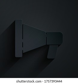 Paper cut Megaphone icon isolated on black background. Speaker sign. Paper art style. Vector Illustration