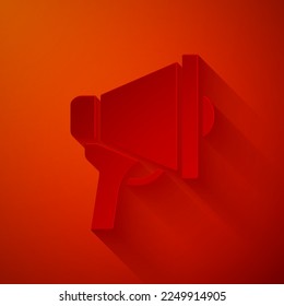 Paper cut Megaphone icon isolated on red background. Speaker sign. Paper art style. Vector
