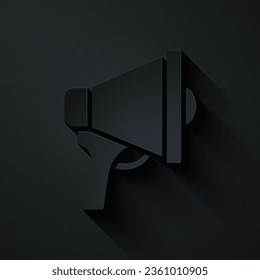 Icono del Megáfono cortado en papel aislado en el fondo negro. Firma del altavoz. Estilo de arte de papel. Vector