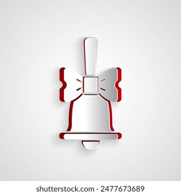 Paper cut Merry Christmas ringing bell icon isolated on grey background. Alarm symbol, service bell, handbell sign, notification. Paper art style. Vector