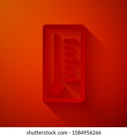 Paper cut Meteorology thermometer measuring heat and cold icon isolated on red background. Thermometer equipment showing hot or cold weather. Paper art style. Vector Illustration