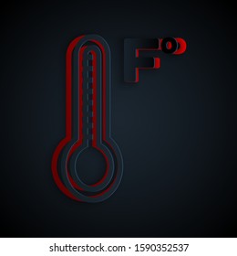 Paper cut Meteorology thermometer measuring heat and cold icon isolated on black background. Temperature Fahrenheit. Paper art style. Vector Illustration