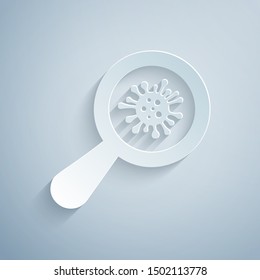 Paper cut Microorganisms under magnifier icon isolated on grey background. Bacteria and germs, cell cancer, microbe, virus, fungi. Paper art style. Vector Illustration