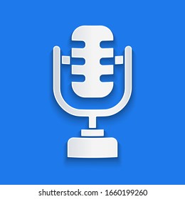 Paper Cut Microphone Icon Isolated On Blue Background. On Air Radio Mic Microphone. Speaker Sign. Paper Art Style. Vector Illustration