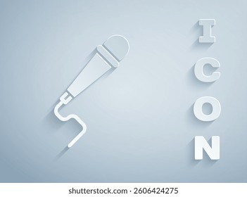 Paper cut Microphone icon isolated on grey background. On air radio mic microphone. Speaker sign. Paper art style. Vector Illustration