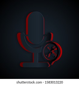 Paper cut Microphone with screwdriver and wrench icon isolated on black background. Adjusting, service, setting, maintenance, repair, fixing. Paper art style. Vector Illustration