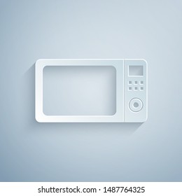 Paper cut Microwave oven icon isolated on grey background. Home appliances icon.Paper art style. Vector Illustration