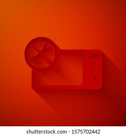 Paper cut Microwave oven with screwdriver and wrench icon isolated on red background. Adjusting, service, setting, maintenance, repair, fixing. Paper art style. Vector Illustration