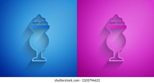 Paper cut Milkshake icon isolated on blue and purple background. Plastic cup with lid and straw. Paper art style. Vector