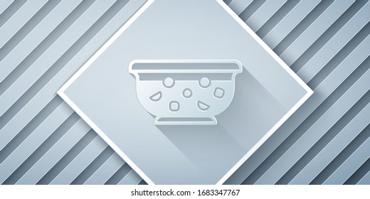 Paper cut Mixed punch with fresh fruits in bowl icon isolated on grey background. Paper art style. Vector Illustration