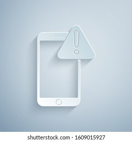 Paper cut Mobile phone with exclamation mark icon isolated on grey background. Alert message smartphone notification. Paper art style. Vector Illustration