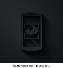 Paper cut Mobile phone and eye scan icon isolated on black background. Scanning eye. Security check symbol. Cyber eye sign. Paper art style. Vector Illustration