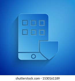 Paper cut Mobile phone with shield icon isolated on blue background. Smartphone insurance. Security, safety, protection, protect concept. Paper art style. Vector Illustration