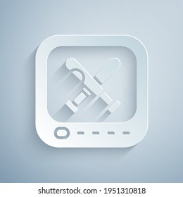 Paper cut Monitor with baseball ball and bat on the screen icon isolated on grey background. Online baseball game. Paper art style. Vector
