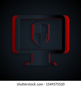 Paper cut Monitor and shield icon isolated on black background. Computer security, firewall technology, internet privacy safety or antivirus. Paper art style. Vector Illustration
