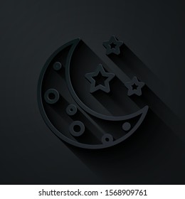 Paper cut Moon and stars icon isolated on black background. Paper art style. Vector Illustration