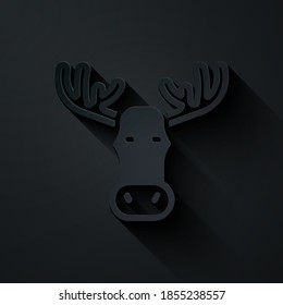 Paper cut Moose head with horns icon isolated on black background. Paper art style. Vector.