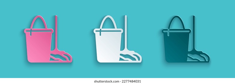 Paper cut Mop and bucket icon isolated on blue background. Cleaning service concept. Paper art style. Vector