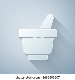 Paper cut Mortar and pestle icon isolated on grey background. Paper art style. Vector Illustration