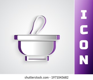 Paper cut Mortar and pestle icon isolated on grey background. Paper art style. Vector