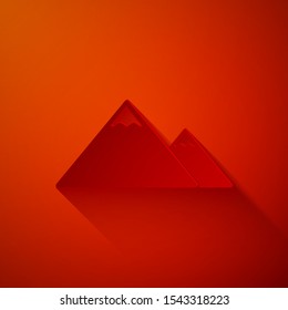 Paper cut Mountains icon isolated on red background. Symbol of victory or success concept. Paper art style. Vector Illustration
