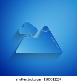 Paper cut Mountains icon isolated on blue background. Symbol of victory or success concept. Paper art style. Vector Illustration