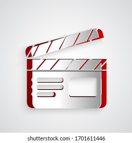 Paper cut Movie clapper icon isolated on grey background. Film clapper board. Clapperboard sign. Cinema production or media industry. Paper art style. Vector Illustration