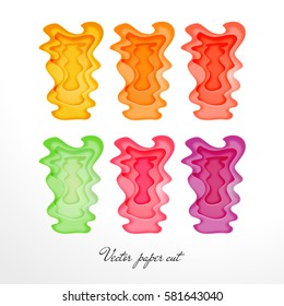 Paper cut multilayer multicolor set of designs with irregular edges. 
