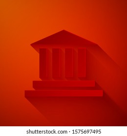 Paper cut Museum building icon isolated on red background. Paper art style. Vector Illustration
