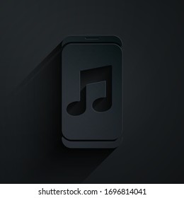 Paper cut Music player icon isolated on black background. Portable music device. Paper art style. Vector Illustration