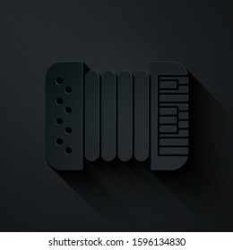 Paper cut Musical instrument accordion icon isolated on black background. Classical bayan, harmonic. Paper art style. Vector Illustration