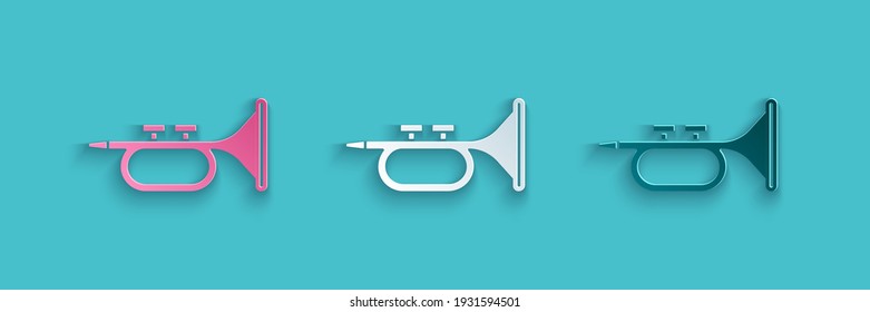 Paper cut Musical instrument trumpet icon isolated on blue background. Paper art style. Vector