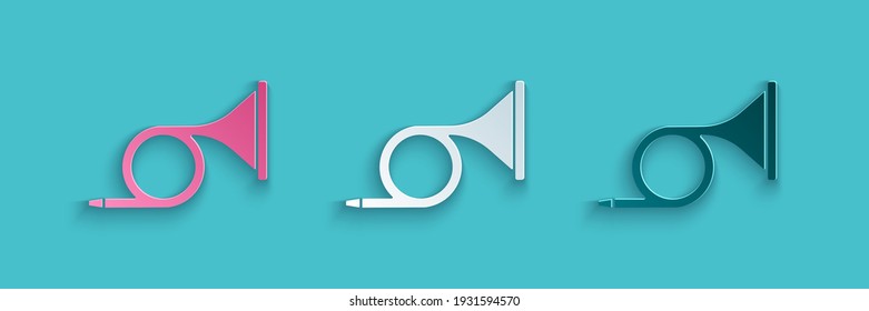 Paper cut Musical instrument trumpet icon isolated on blue background. Paper art style. Vector