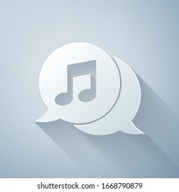 Paper cut Musical note in speech bubble icon isolated on grey background. Music and sound concept. Paper art style. Vector Illustration