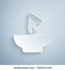 Paper cut Nachos in plate icon isolated on grey background. Tortilla chips or nachos tortillas. Traditional mexican fast food. Paper art style. Vector Illustration