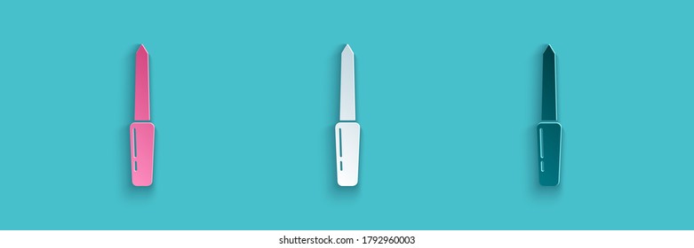 Paper cut Nail file icon isolated on blue background. Manicure tool. Paper art style. Vector Illustration