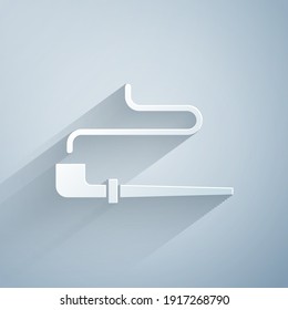 Paper cut Native American indian smoking pipe icon isolated on grey background. Paper art style. Vector