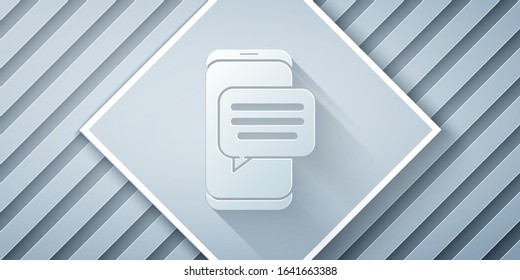 Paper cut New chat messages notification on phone icon isolated on grey background. Smartphone chatting sms messages speech bubbles. Paper art style. Vector Illustration