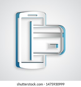 Paper cut NFC Payment icon isolated on grey background. Mobile payment. NFC smartphone concept. Transfer icon. Paper art style. Vector Illustration