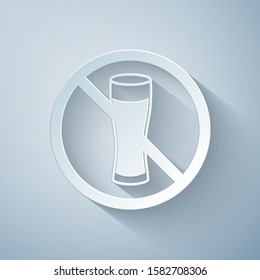 Paper cut No alcohol icon isolated on grey background. Prohibiting alcohol beverages. Forbidden symbol with beer bottle glass. Paper art style. Vector Illustration