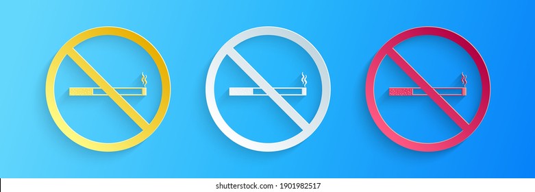 Paper cut No Smoking icon isolated on blue background. Cigarette symbol. Paper art style. Vector.