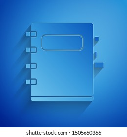 Paper cut Notebook icon isolated on blue background. Spiral notepad icon. School notebook. Writing pad. Diary for school. Paper art style. Vector Illustration