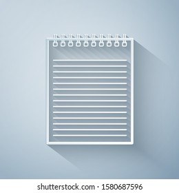 Paper cut Notebook icon isolated on grey background. Spiral notepad icon. School notebook. Writing pad. Diary for business. Notebook cover design. Paper art style. Vector Illustration