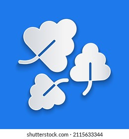 Paper cut Oak leaf icon isolated on blue background. Paper art style. Vector