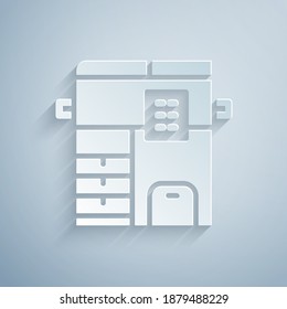 Paper cut Office multifunction printer copy machine icon isolated on grey background. Paper art style. Vector.