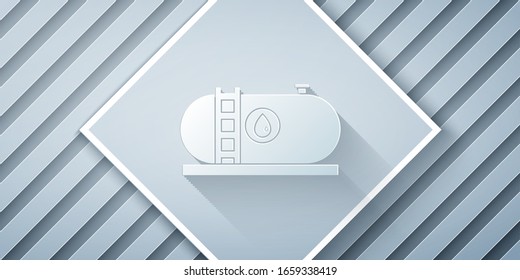 Paper cut Oil and gas industrial factory building icon isolated on grey background. Paper art style. Vector Illustration